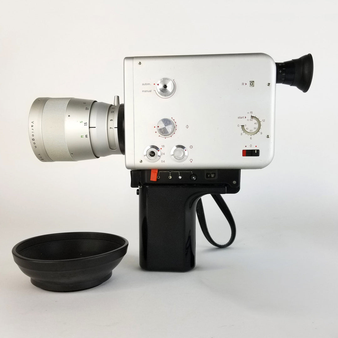 Side view of the Nizo S800 Super 8 movie camera, showing the viewfinder eyepiece, lens hood, and main controls.