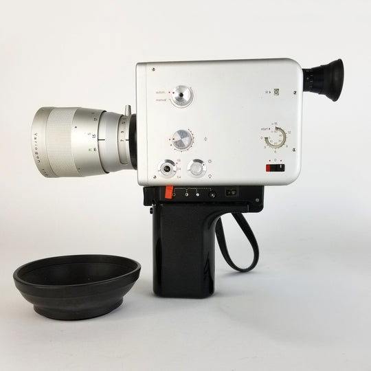 Side view of the Nizo S800 Super 8 movie camera, showing the viewfinder eyepiece, lens hood, and main controls.